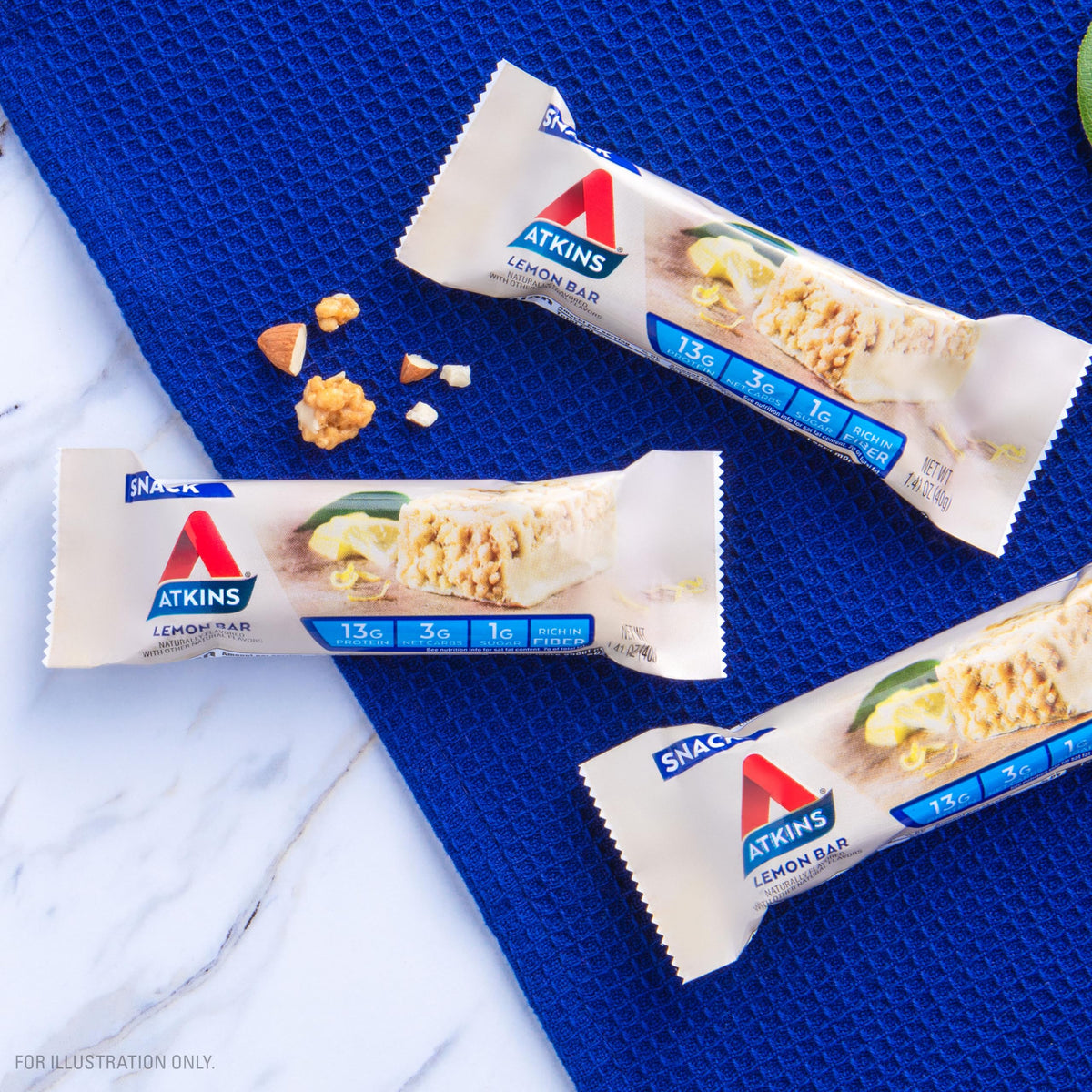 Atkins Lemon Snack Bar nutrition facts label indicates 13g protein per serving.
