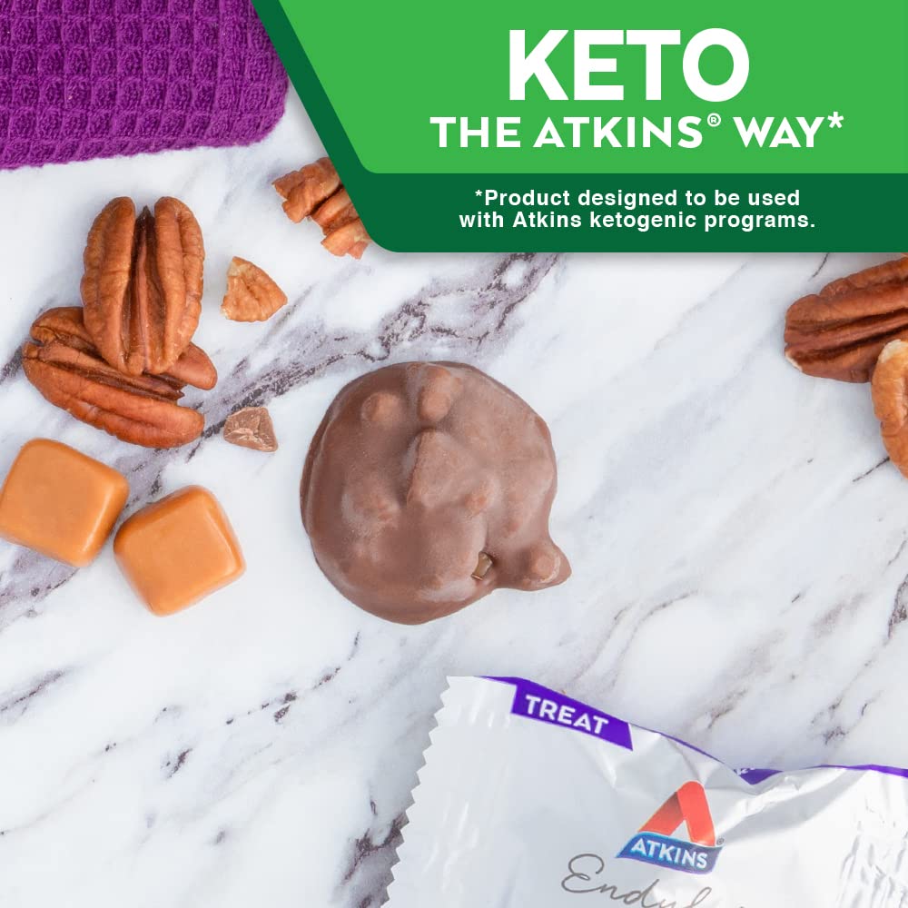 Nutrition label on Atkins Pecan Caramel Clusters showing 2g sugar and 2g net carbs.