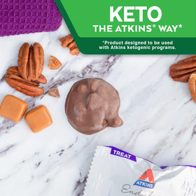 Nutrition label on Atkins Pecan Caramel Clusters showing 2g sugar and 2g net carbs.