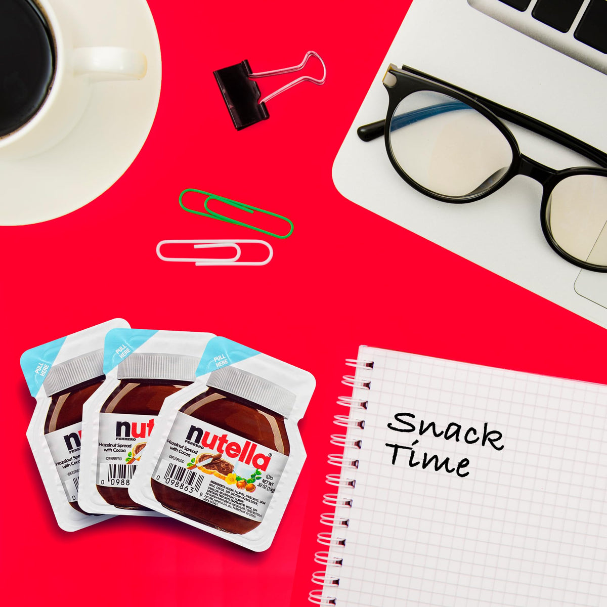 Nutella mini cups with spoons arranged for sharing at meetings