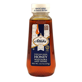 Attiki Pure Greek Honey bottle with thyme and wildflowers, rich aroma and thick texture.