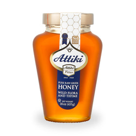 Attiki pure Greek honey with wild flora and thyme in a jar, great for baking.