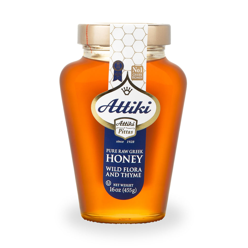 Attiki pure Greek honey with wild flora and thyme in a jar, great for baking.