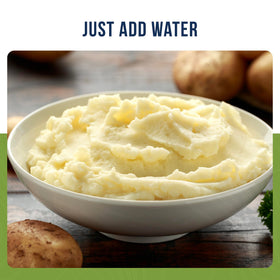 Creamy mashed potatoes in a bowl with butter for flavor