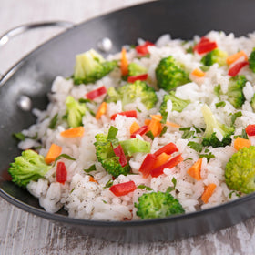 Serving scoop with Augason Farms rice for quick, easy meals.