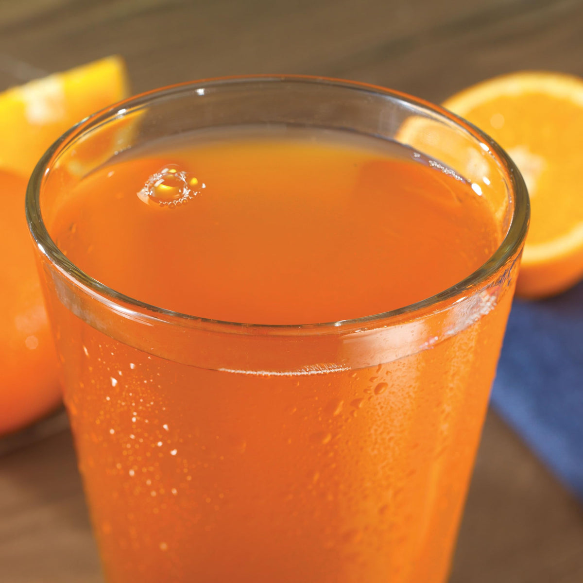 Camping pack including Orange Delight for easy hydration on the go.