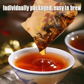 Cup of Aultink Ginseng Eight Treasure Tea during a cozy brew