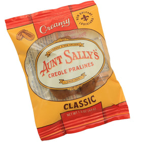 Texture close-up of Aunt Sally's pralines highlighting fudgy center.