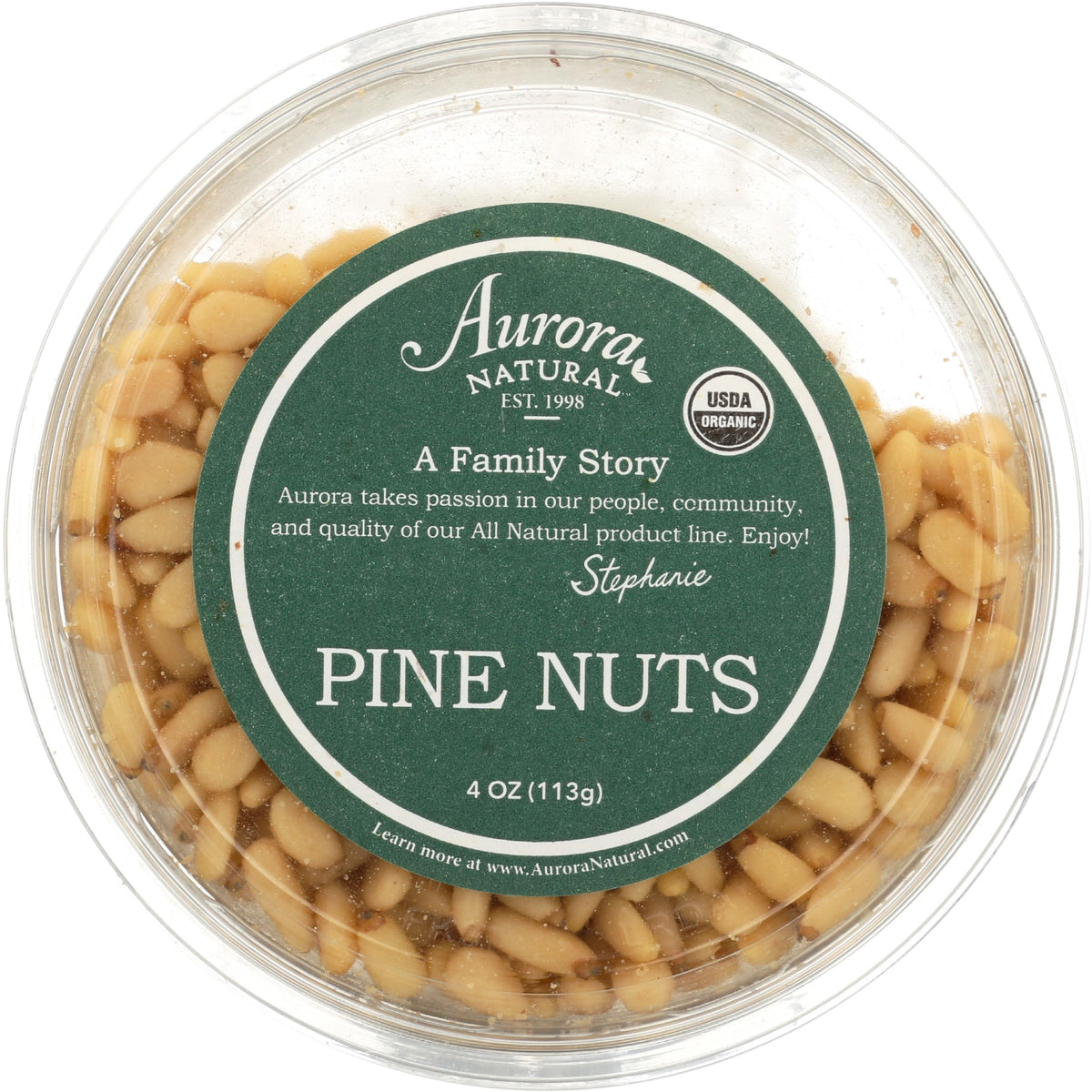 Aurora Organic Pine Nuts 4oz pack close-up, highlighting fresh texture for versatile use.