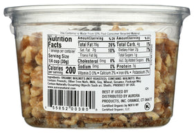 Close-up texture of Aurora Organic Walnut Halves reveals rich aroma and crunch.