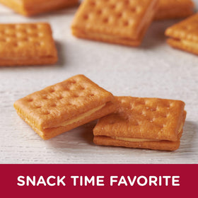 Austin Cheddar Cheese Flavored Sandwich Crackers close-up showing crisp layers and cheesy center.