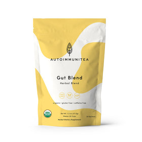 Autoimmuni-Tea digestive tea bags in a cup promoting gentle digestion.
