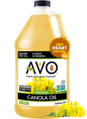AVO Organic Canola Oil bottle pour—ideal for high-heat frying and sautéing.