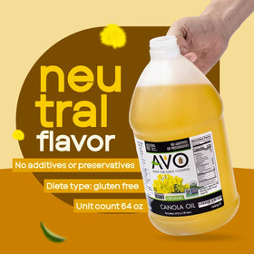 AVO Organic Canola Oil on kitchen counter with fresh ingredients.