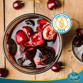 Baar Cherry Cola Syrup bottle on a clean kitchen counter