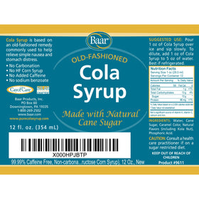 Baar Cola Syrup poured over ice for a refreshing, non-carbonated drink.