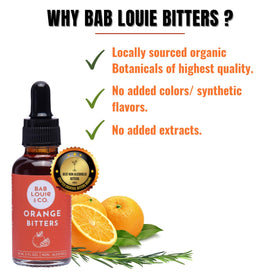 Bab Louie & Co. Orange bitters bottle delivers zesty citrus notes for vibrant mixed drinks.
