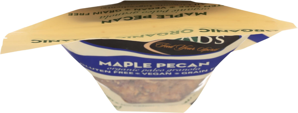 Back Roads Maple Pecan Granola being poured for a quick snack.