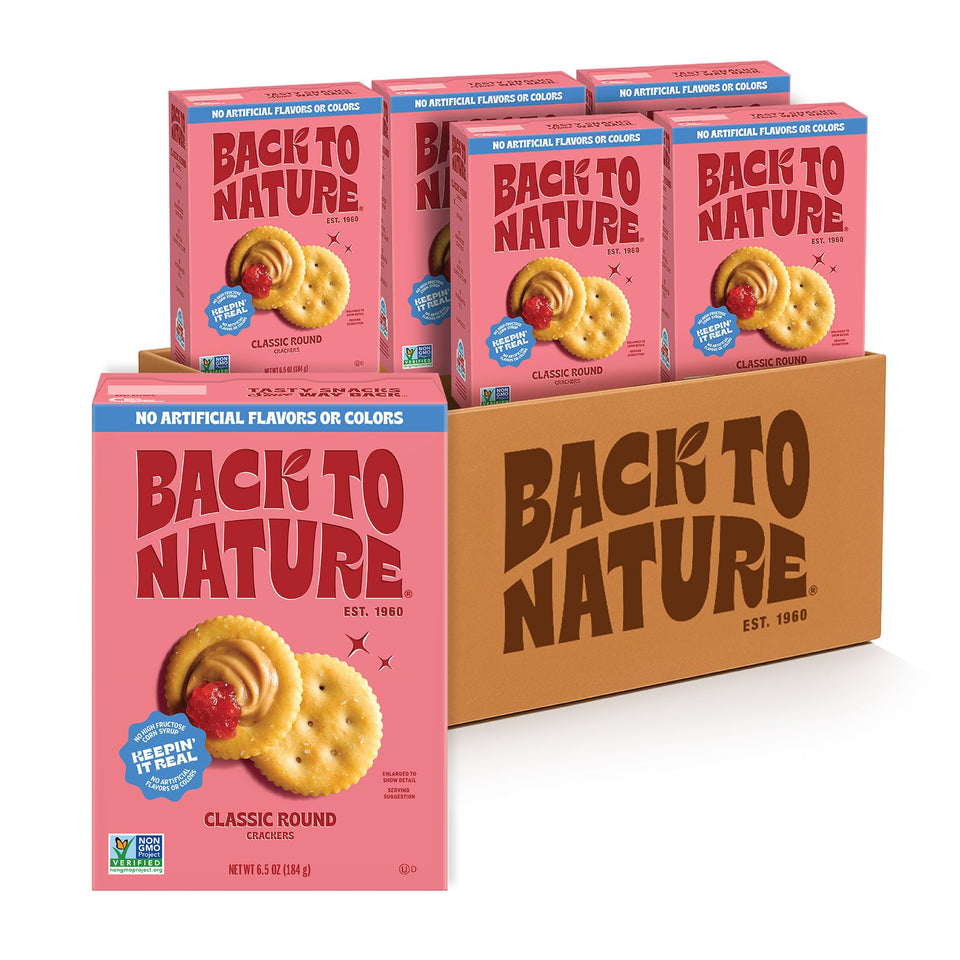 Back to Nature Classic Round Crackers on a cheese board, crispy and dairy-free.