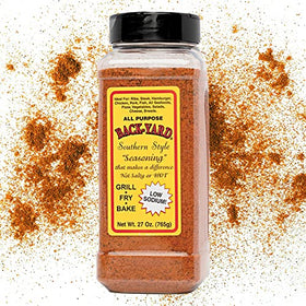Back-yard Southern Style Original Seasoning bottle being poured onto beef for flavor.
