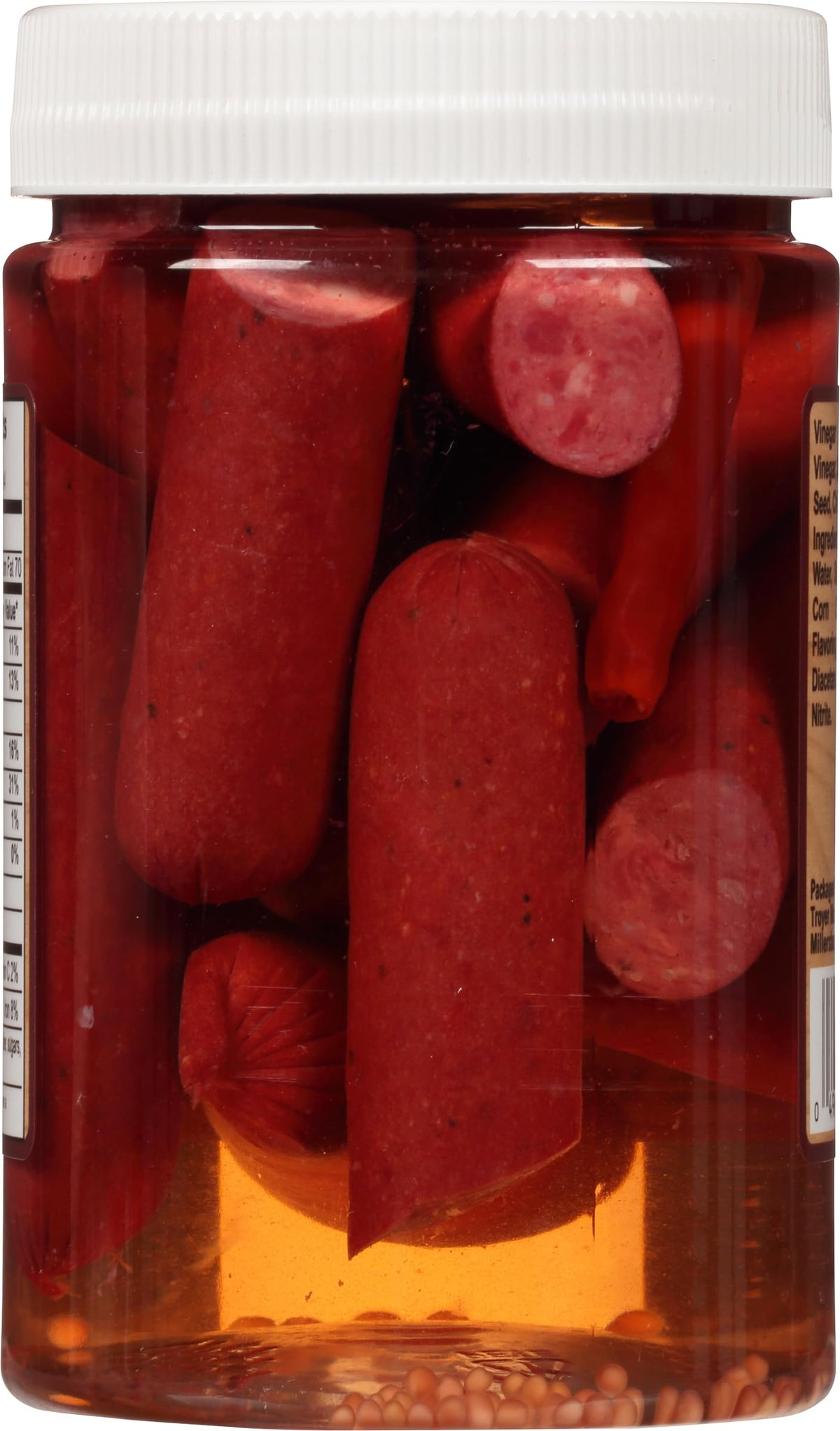 Backroad Country closeup of sausage ingredients, showcasing smoked meat and brine.