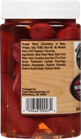 Backroad Country sausage slices on a charcuterie board offer bold tangy flavor