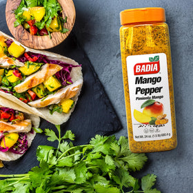 Badia Mango Pepper Seasoning on grilled chicken for tropical flavor.