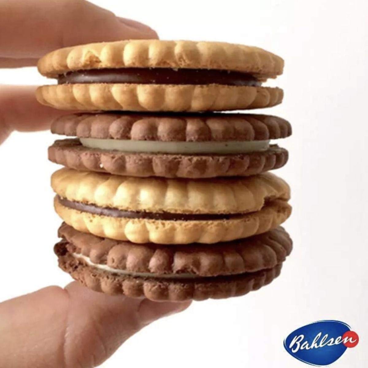 Bahlsen HIT vanilla biscuit sandwich reveals creamy cocoa center.