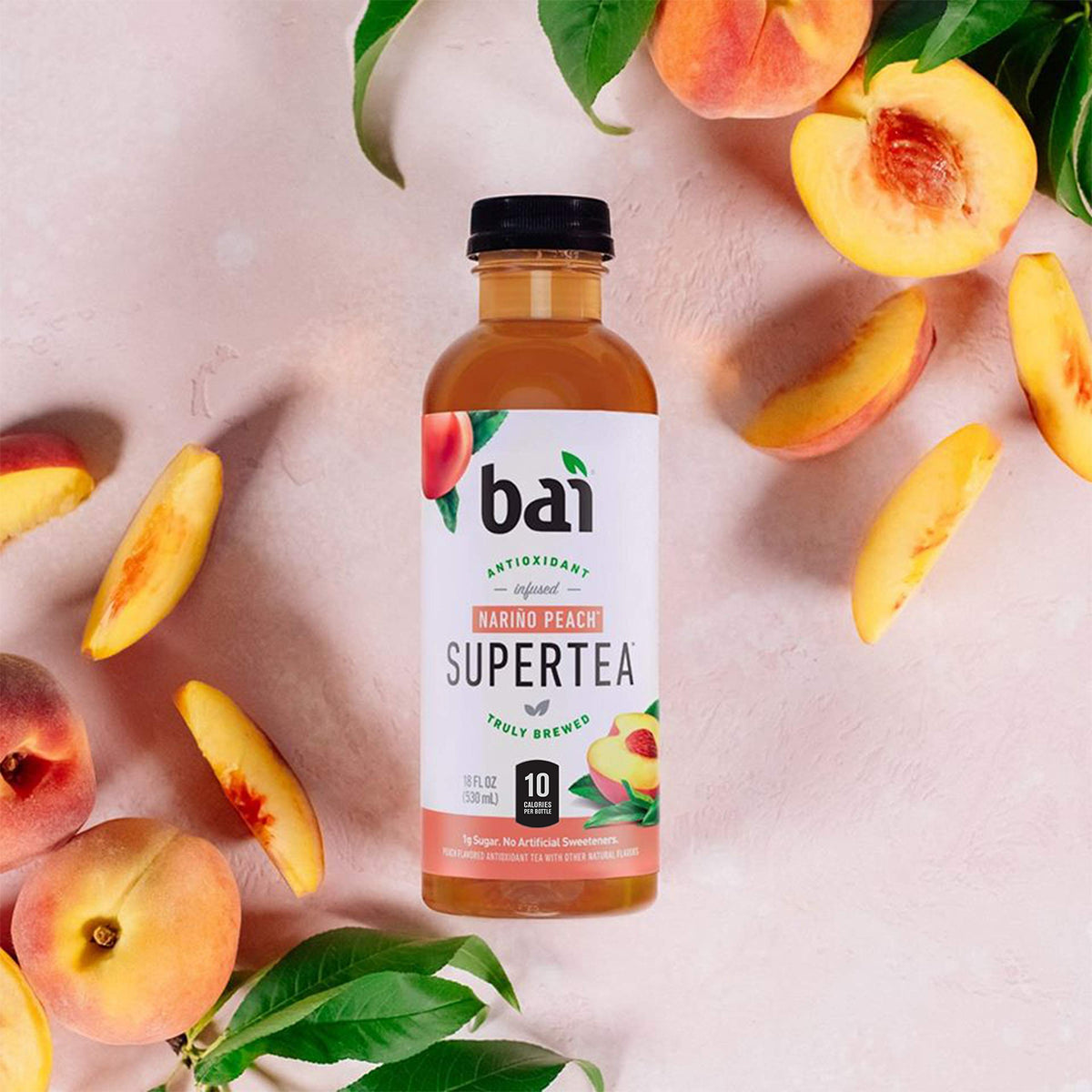 Bai Narino Peach tea bottle on a picnic setting.