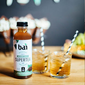 Bai Socorro Sweet bottle poured over ice for refreshing sip.