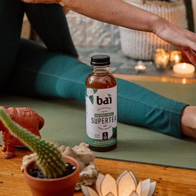 Bai Socorro Sweet on-the-go bottle during a workout break.