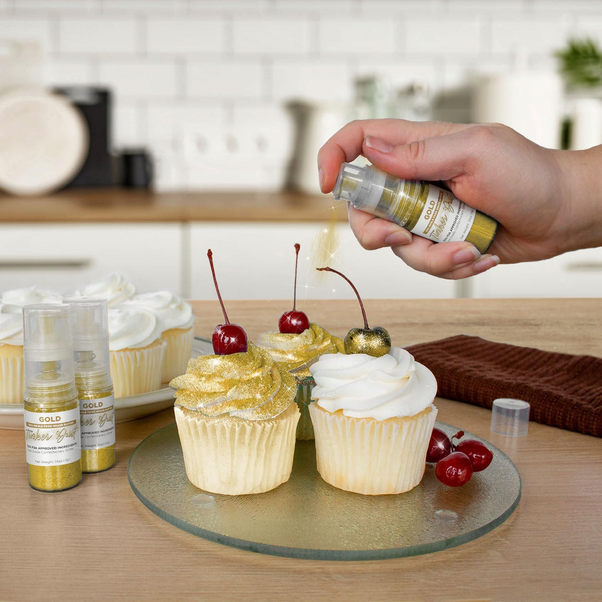 Bakell Gold Tinker Dust pour for shimmering beverage garnish.