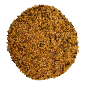 Baldridge Secret Seasoning closeup reveals herb-forward mix for savory dishes.