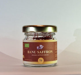 Banu Saffron glass jar packaging highlights award-winning saffron quality.