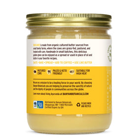 Banyan Botanicals ghee being poured, showcasing smooth clarified butter for sautéing.