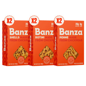 Banza chickpea pasta variety pack box on counter highlights protein-rich, plant-based noodles.