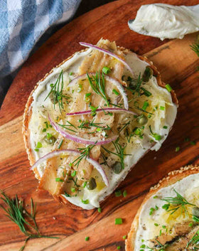 Bar Harbor kippers in a salad bowl adding protein and ocean notes.
