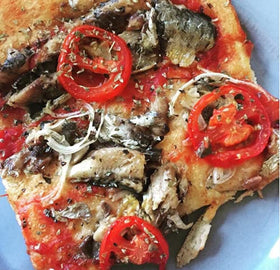Bar Harbor sardine fillets texture closeup highlights tender, flaky morsels.