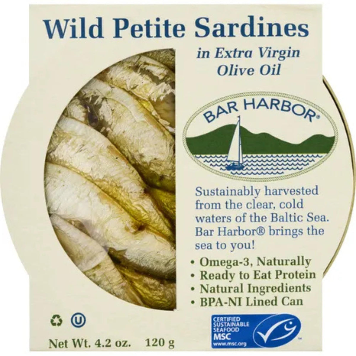 Bar Harbor sardines in EVOO being poured for a rich flavor boost.