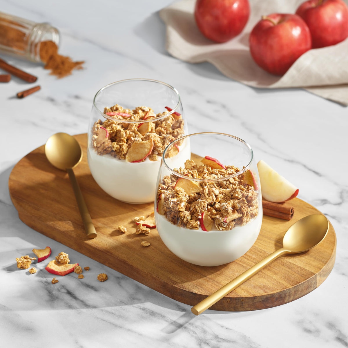 Serving bowl of Bare Granola Cereal with milk and fruit
