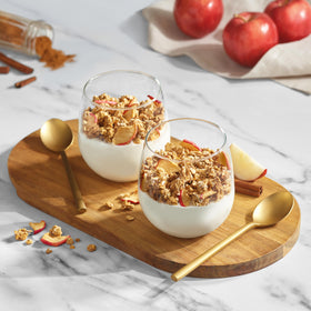 Serving bowl of Bare Granola Cereal with milk and fruit