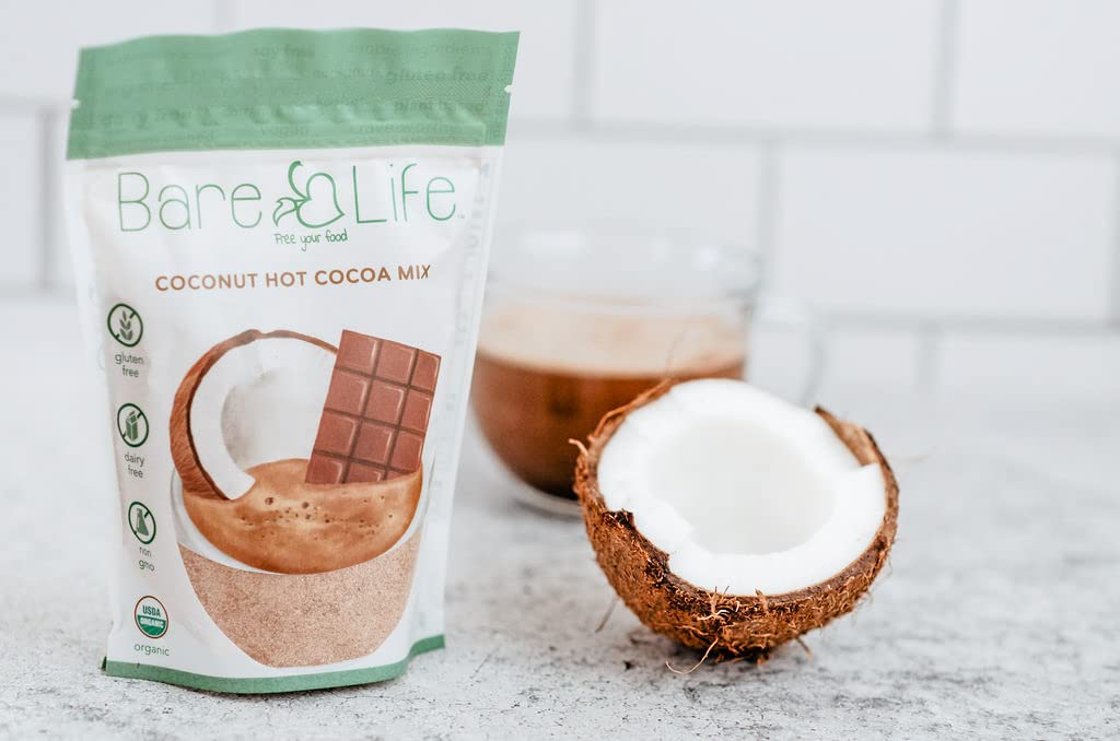 Bare Life steaming cup of coconut hot cocoa, cozy and dairy-free
