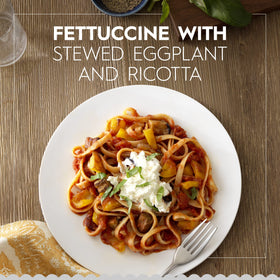 Barilla fettuccine ribbon strands ideal for hearty tomato or cream sauces.