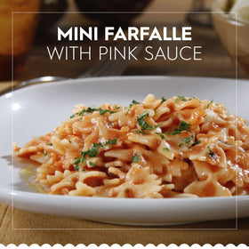 Barilla Mini Farfalle cooked bowties on a plate ready for sauces.