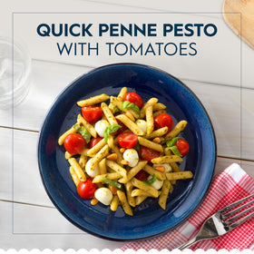Barilla Ready Pasta Penne microwaving in a pouch showing fast prep.