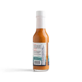 Barnacle Foods Bullwhip Kelp Hot Sauce with seafood dish for elevating flavor