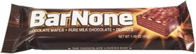 BarNone milk chocolate closeup reveals creamy coating and peanuts.