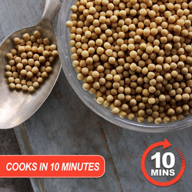 Baron's couscous pearls shimmering in a pan, ideal for quick meals.