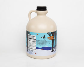 Barred Woods amber rich maple syrup jar showcases premium all natural sweetness