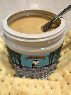 Barred Woods Maple Cream spread on pancakes, creamy texture elevates breakfast.